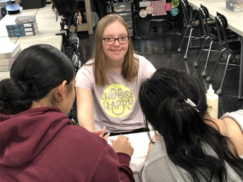 Centennial High cosmetology students style hair